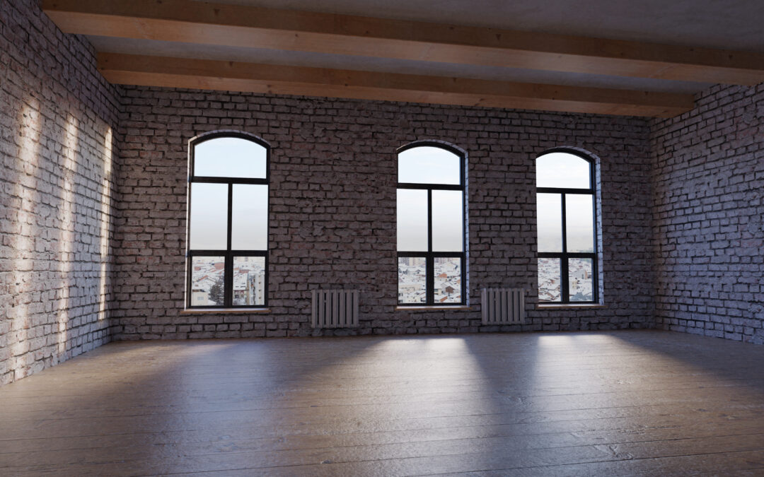 Wooden dance floor in studio with white bricks.
